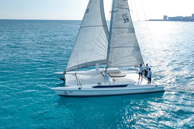 All-Inclusive Isla Mujeres Catamaran with Free Transportation - Snorkeling at El Meco Reef for about 50 minutes