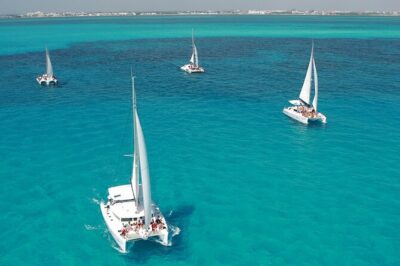 All-Inclusive Isla Mujeres Catamaran with Free Transportation