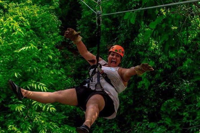 ATV Adventure Combo with Snorkeling, Ziplines, Cenote, and Lunch - Riding the ATVs through the jungle course