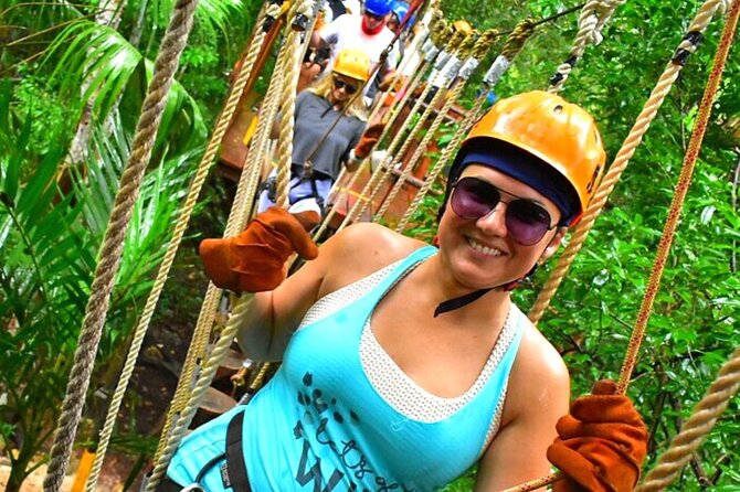 ATV Adventure, Interactive Bridges, Ziplines, Cenote and Lunch - Three ziplines and hanging bridges above the trees