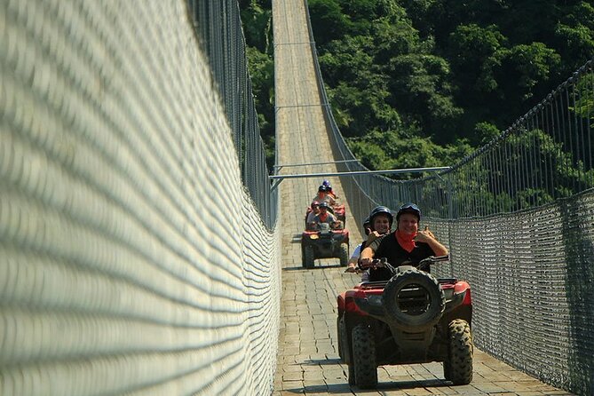 ATV and RZR Jorullo Bridge Experience in Puerto Vallarta - Crossing Jorullo Bridge above the trees