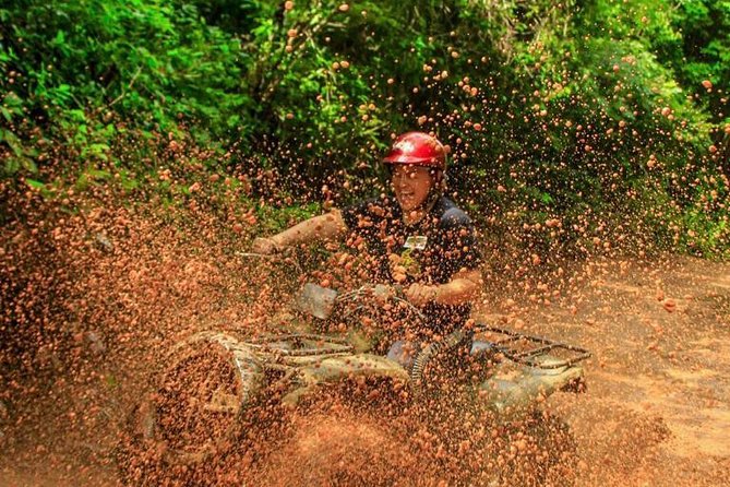 ATV Tour with Cenote swim, Ziplines, Transportation and Lunch Included - A full jungle sampler for $48.75