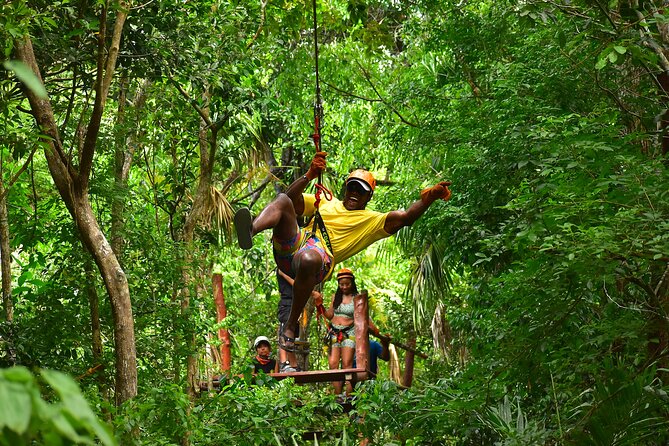 ATV Tour with Cenote swim, Ziplines, Transportation and Lunch Included - Ziplines over the Puerto Morelos trees