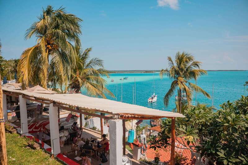 Bacalar: 3-hr Pontoon Boat Tour with Beach Club + Kayaks - Cenote Esmeralda and Cocalitos: pretty stops with limited time
