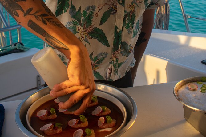 Bacalar - Gourmet Tour in Private Catamaran with Cocktails Included - Cocktails, fruit, and the pace on board