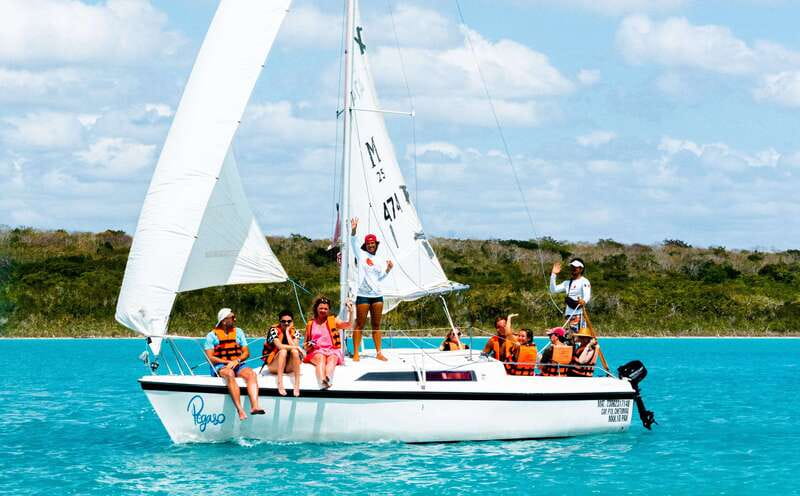 Bacalar: Group Sailing Trip with Swimming and Drinks - Cenote Negro and the changing depth of the lagoon