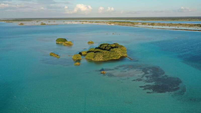 Bacalar: Group Sailing Trip with Swimming and Drinks - Fruit, drinks, and the practical side of the ride