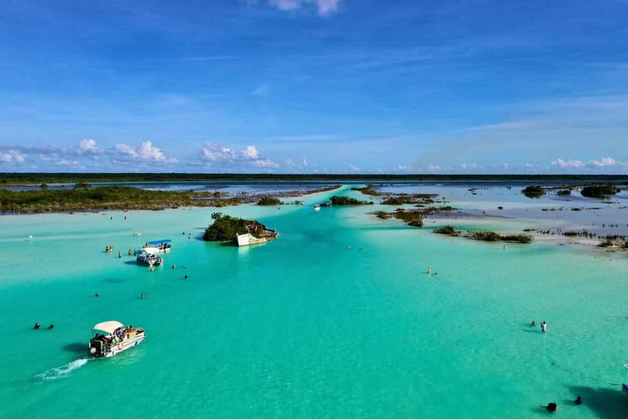 Bacalar: Lagoon, Pirate Canal, Stromatolite Day Trip w/Lunch - Arriving at Bacalar by speedboat