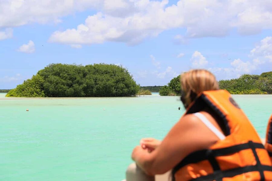 Bacalar: Lagoon, Pirate Canal, Stromatolite Day Trip w/Lunch - Cenote Negro and the lagoon’s darker blue