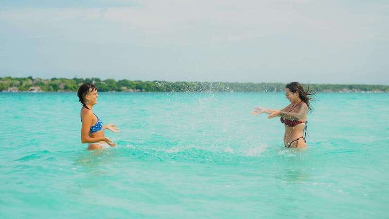 Bacalar Lagoon Sightseeing Boat Tour with Open Bar & Snack - Bird Island and the open-water pause