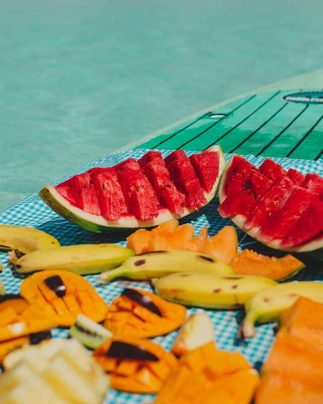 Bacalar Lagoon Sightseeing Boat Tour with Open Bar & Snack - The secret stop, fruit, and sunset