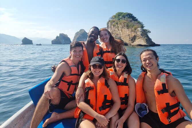 Boat and Snorkel Tour to 5 Islands of Los Arcos - Boarding the small boat at Mismaloya