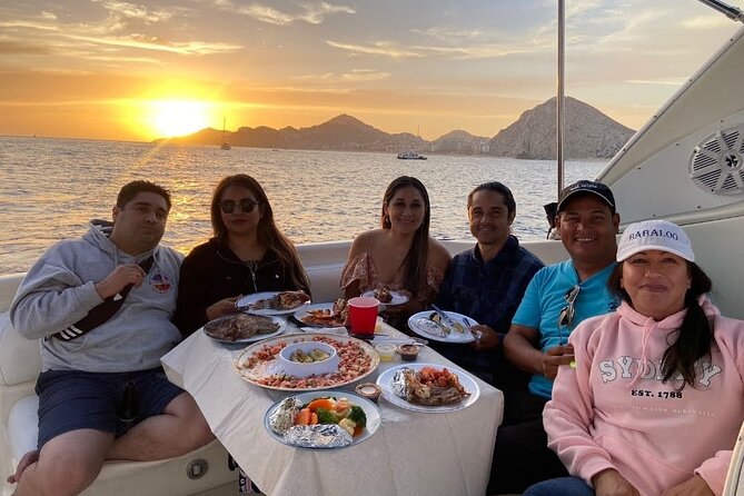 Cabo Arch Sunset Yacht Tour - Dinner & Drinks — Up to 18 Guests - Swimming, snorkeling, and floating near shore