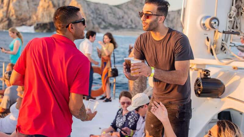 Cabo San Lucas: 2 Hour Sunset Cruise with Food and Wine - Pickup across Cabo and the ride to port