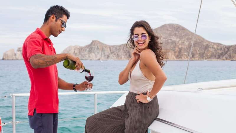 Cabo San Lucas: 2 Hour Sunset Cruise with Food and Wine - Boarding the luxury catamaran