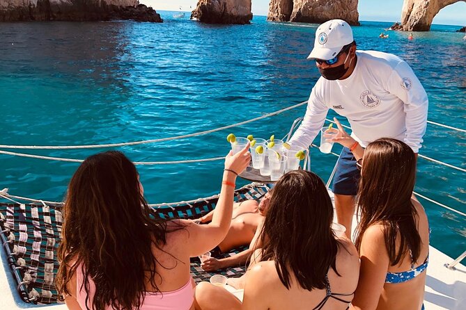 Cabo San Lucas and Santa Maria Bay Snorkeling Sightseeing Cruise - Paddleboards, kayaks, and a floating mat