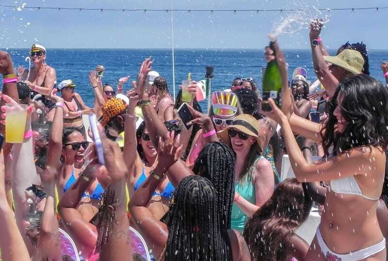 Cabo San Lucas: Hip Hop Boat Party with Unlimited Drinks - The champagne shower finale