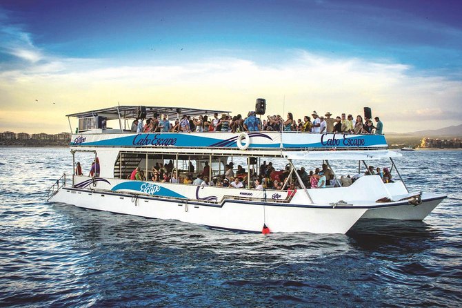 Cabo San Lucas Sunset Dinner Cruise with Open Bar - The boat, the seating, and the party atmosphere