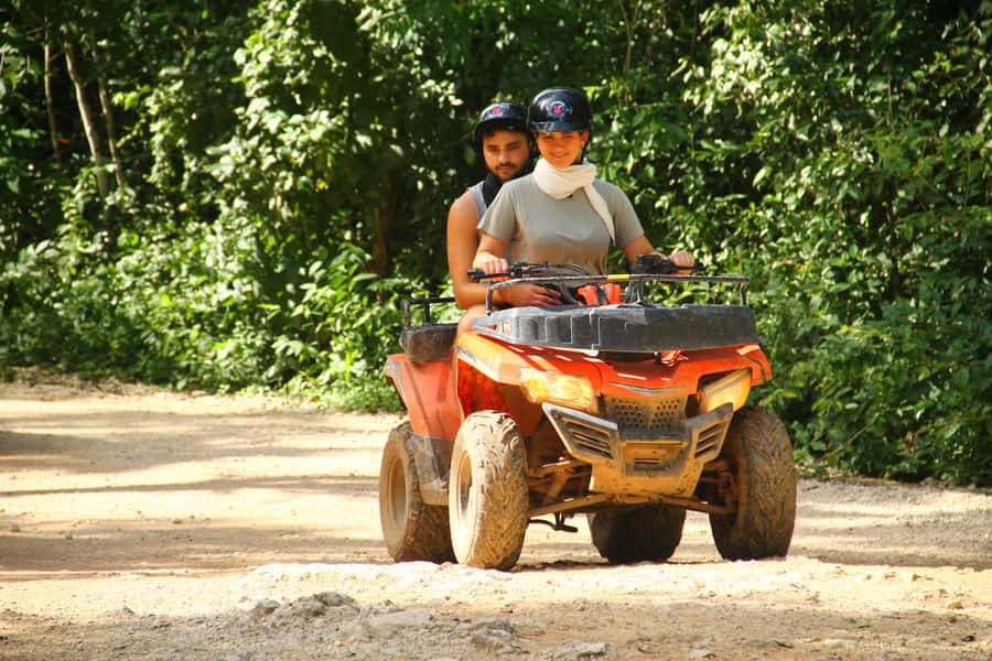 Cancún: ATV, Zipline, and Cenote Adventure with Lunch - Ziplining above the jungle