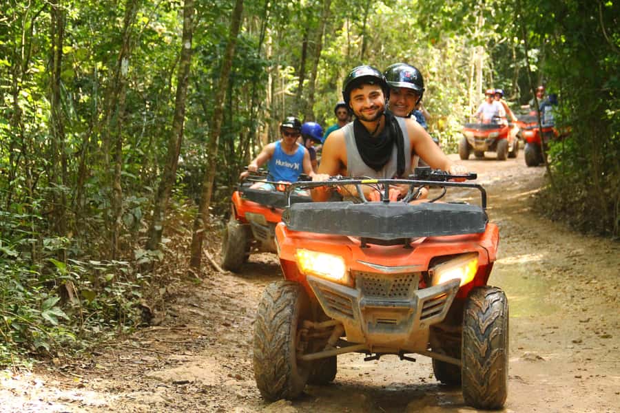 Cancún: ATV, Zipline, and Cenote Adventure with Lunch - ATV riding on rough jungle trails