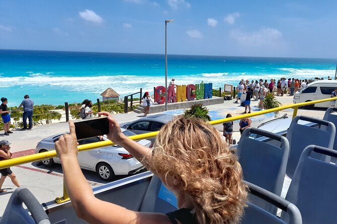 Cancun City Sightseeing and Shopping Tour on a Double Decker bus - Guides, language, and the ride itself