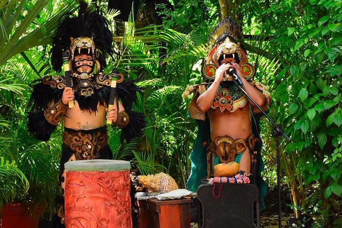 Cancun Combo Tour: ATV and Zip- lines with Cenote Swim - ATV riding on a rough jungle track