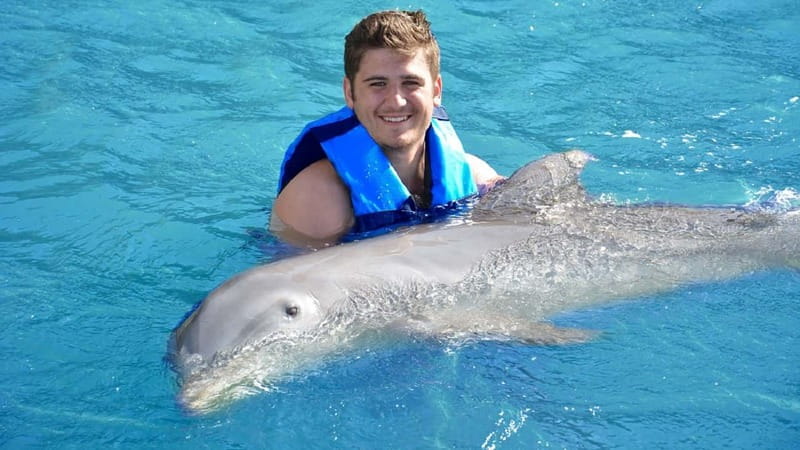Cancún: Dolphin Encounter on Isla Mujeres with Buffet - Sailing from Playa Langosta at 9:00 AM