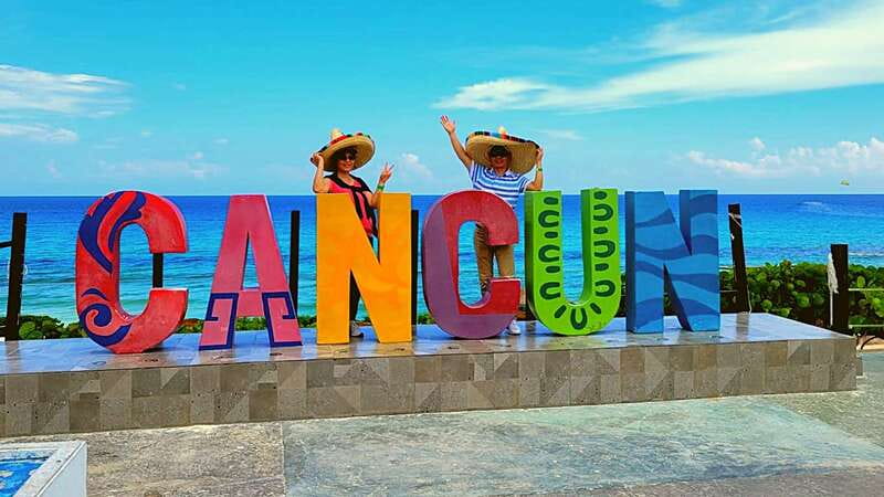 Cancun: Guided City Tour with Shopping by Double Decker Bus - Plaza 28 and the downtown shopping stop