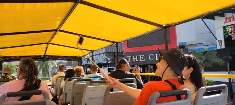 Cancun: Guided City Tour with Shopping by Double Decker Bus - What the $60 price really covers