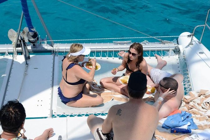 Cancun Half-Day Sailing Catamaran Cruise to Isla Mujeres - Transportation, parking, and the Playa Langosta meeting point