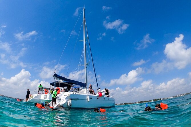 Cancun Sailing Catamaran Islas Mujeres With Luxury Beach Club - El Meco Reef and the snorkeling limits