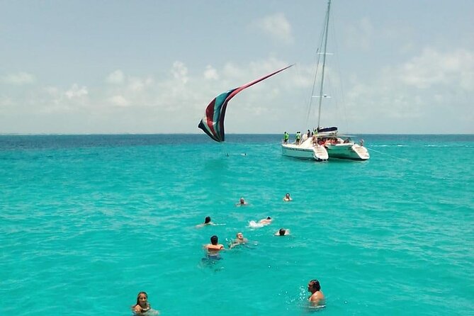 Cancun Sailing Catamaran Islas Mujeres With Luxury Beach Club - Group size, comfort, and the pace of the day