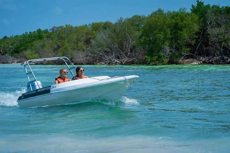 Cancun: Speedboat tour to a Virgin Beach - Driving your own boat through Chacmuchuc Lagoon