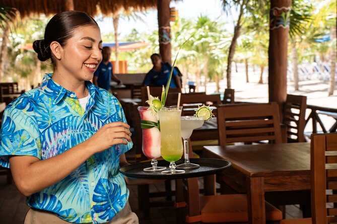 Cozumel: KUZÁ Beach Day, Buffet, Open Bar & Mexican Flavors Class - Music, games, and Mexican traditions