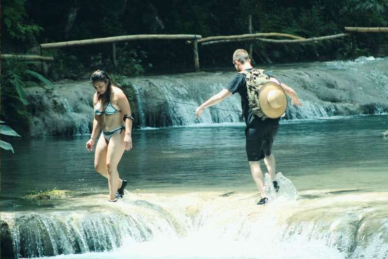 From Huatulco: Magical Copalitilla Waterfalls with Entry - A community market stop with coffee, chocolate, and mezcal