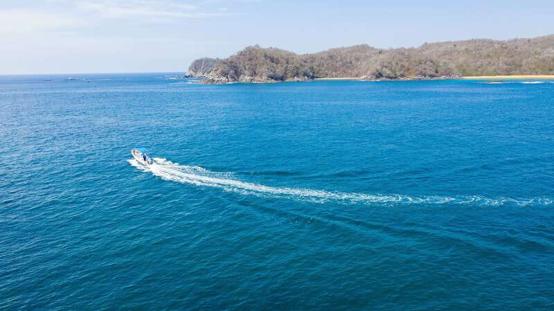 From La Crucecita: Private Huatulco 7 or 5 Bays Boat Trip - Choosing five bays or seven bays