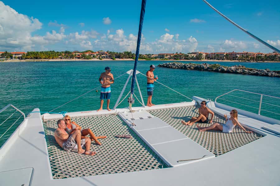 From Puerto Aventuras: Share Catamaran Tour - The one-hour sail toward the reef