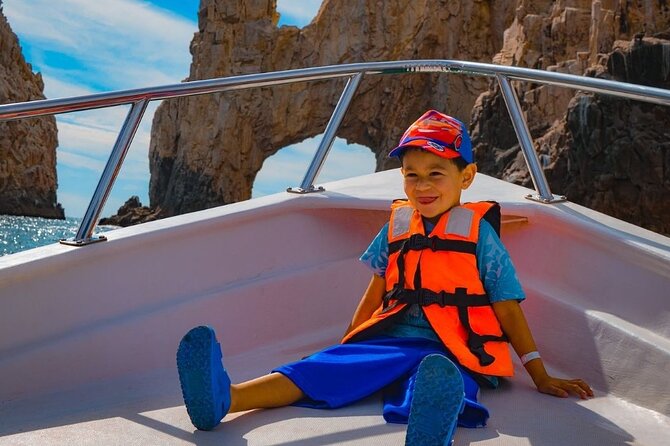 Glass-bottom boat tour to the Arch + beach time - What the guide and crew add