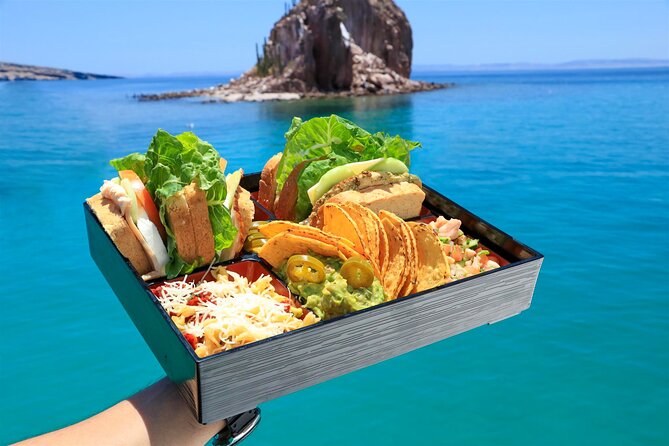 Half Day Cabo Snorkel Adventure with Lunch and Open Bar - Lunch, fruit, and the open bar