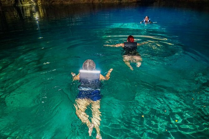 Half Day in Cancun Atvs Ziplines and Cenote Park - Swimming in a natural cenote cave