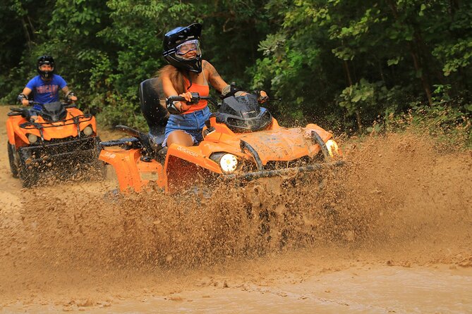 Hidden Cenote Swim & ATV Jungle Adventure with Transportation - Riding the Can-Am Outlander on jungle trails
