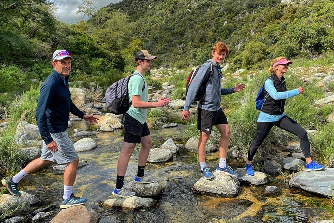 Hike the native Pericu road in Sierra de la Laguna. - Swimming in cool pools and under a small waterfall