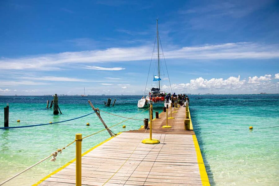 Isla Mujeres: Catamaran Ride with Open Bar, Snorkeling, and Lunch - Sailing the Caribbean on a catamaran