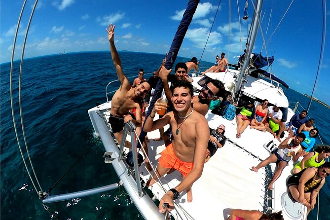 Isla Mujeres Catamaran + Snorkel + Open Bar on board + Buffet - Boarding the catamaran and meeting the crew