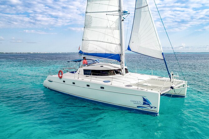 Isla Mujeres Catamaran Tour with Open Bar, Lunch and Snorkeling - Snorkeling in Isla Mujeres waters