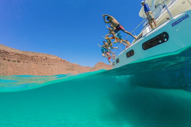 La Paz World Class Snorkeling in Balandras Hidden Beaches - Boarding the French catamaran at Pichilingue