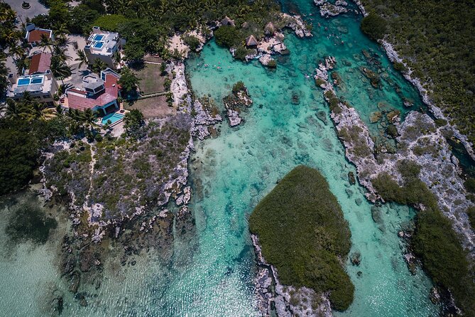 Magical Cenote and Paradise Lagoon Snorkeling Adventure - Entering the cool underground cenote