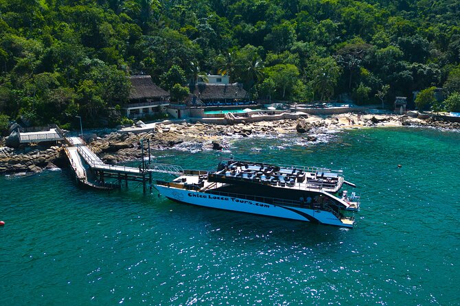 Mega Catamarans ALL INCLUSIVE Remote Paradise Beach Adventure - Playa Chica Locca, a beach club with a remote setting