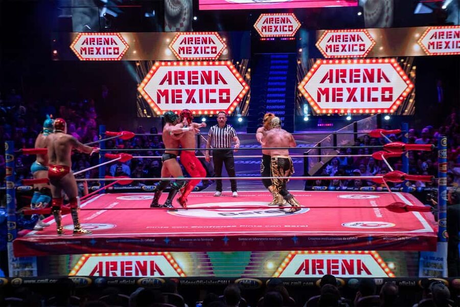 Mexico City: Lucha Libre Show, Walking Tour & Tequila - Inside the arena: masks, acrobatics, and crowd noise