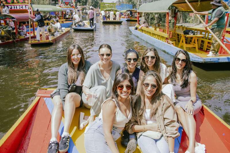 Mexico City: Xochimilco Boat with Guacamole & Premium Drinks - Music, dancing, and the shared atmosphere